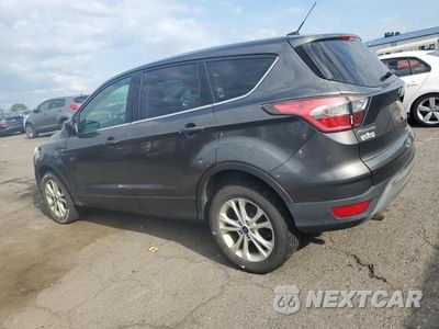 Trzecie zdjęcie samochodu z tyłu: 2017 FORD ESCAPE SE VIN:1FMCU9GD8HUB48430 - miniatura