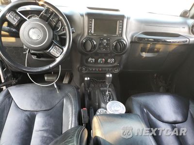 Zdjęcie 8 z 12 samochodu: 2014 JEEP WRANGLER UNLIMITED SAHARA VIN:1C4BJWEGXEL254044 - miniatura