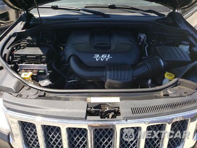 Zdjęcie 12 z 13 samochodu: 2013 JEEP GRAND CHEROKEE OVERLAND VIN:1C4RJFCG3DC609619 - miniatura