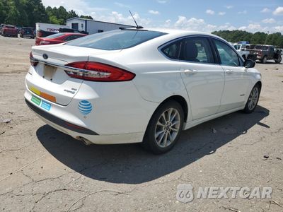 Trzecie zdjęcie samochodu z tyłu: 2017 FORD FUSION SE HYBRID VIN:3FA6P0LUXHR409421 - miniatura