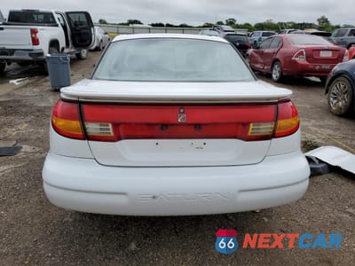 Zdjęcie 6 z 14 samochodu: 2000 SATURN SC2 VIN:1G8ZY1277YZ148504 - miniatura