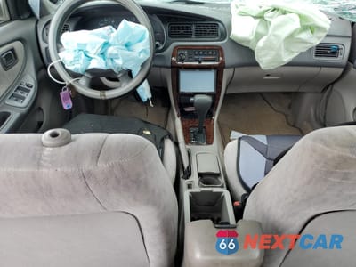 Zdjęcie 8 z 12 samochodu: 1999 NISSAN ALTIMA XE VIN:1N4DL01D5XC181279 - miniatura