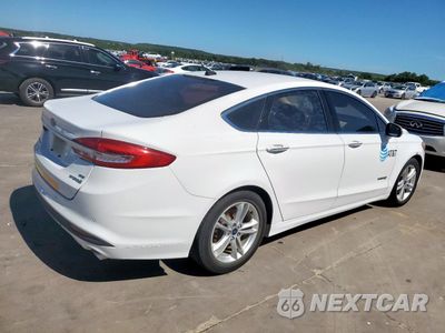 Trzecie zdjęcie samochodu z tyłu: 2018 FORD FUSION SE HYBRID VIN:3FA6P0LU1JR171822 - miniatura