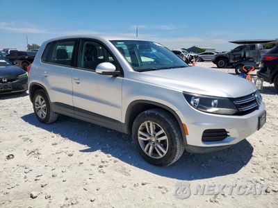 Czwarte zdjęcie samochodu z boku: 2014 VOLKSWAGEN TIGUAN S VIN:WVGAV3AX8EW549304 - miniatura