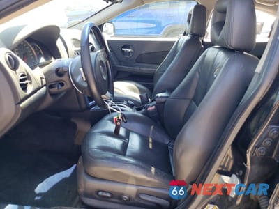 Zdjęcie 7 z 15 samochodu: 2004 PONTIAC GRAND PRIX GTP VIN:2G2WR524X41373476 - miniatura