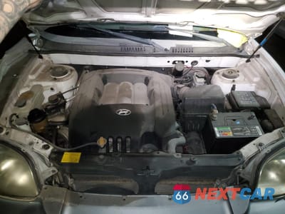 Zdjęcie 12 z 13 samochodu: 2002 HYUNDAI SANTA FE GLS VIN:KM8SC13D22U212989 - miniatura