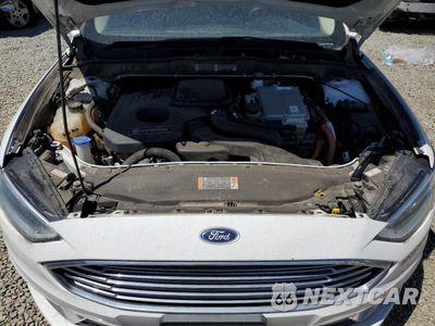 Zdjęcie 11 z 13 samochodu: 2018 FORD FUSION SE HYBRID VIN:3FA6P0LU6JR118677 - miniatura