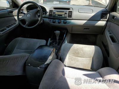 Zdjęcie 8 z 12 samochodu: 2003 TOYOTA CAMRY LE VIN:JTDBE32KX30215061 - miniatura