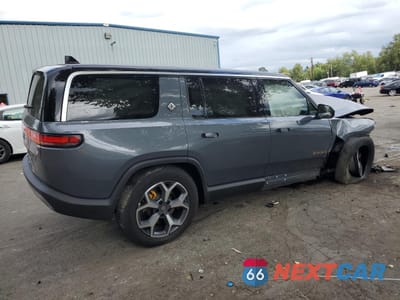 Trzecie zdjęcie samochodu z tyłu: 2022 RIVIAN R1S LAUNCH EDITION VIN:7PDSGABL2NN002627 - miniatura