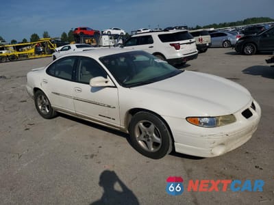 Czwarte zdjęcie samochodu z boku: 2002 PONTIAC GRAND PRIX SE VIN:1G2WK52J82F279953 - miniatura