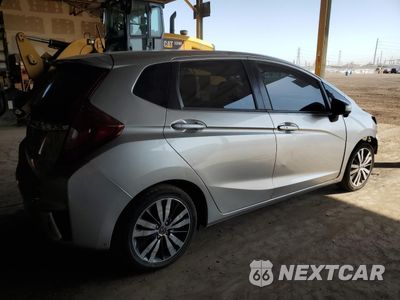 Trzecie zdjęcie samochodu z tyłu: 2015 HONDA FIT EX VIN:3HGGK5H80FM732104 - miniatura