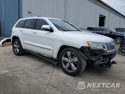 Czwarte zdjęcie samochodu z boku: 2013 JEEP GRAND CHEROKEE OVERLAND VIN:1C4RJFCT5DC580797 - miniatura