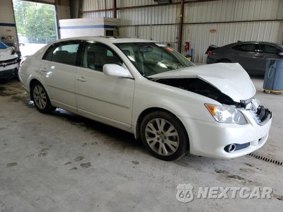 Czwarte zdjęcie samochodu z boku: 2010 TOYOTA AVALON XL VIN:4T1BK3DBXAU352945 - miniatura