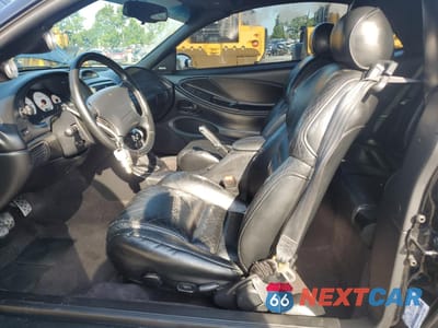 Zdjęcie 7 z 14 samochodu: 1996 FORD MUSTANG COBRA VIN:1FALP46V2TF190068 - miniatura