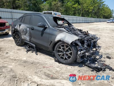 Czwarte zdjęcie samochodu z boku: 2023 BMW X4 XDRIVE30I VIN:5UX33DT07P9S96033 - miniatura