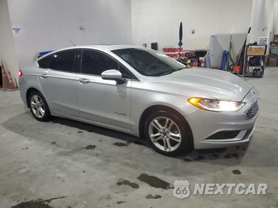 Czwarte zdjęcie samochodu z boku: 2018 FORD FUSION SE HYBRID VIN:3FA6P0LU5JR249308 - miniatura