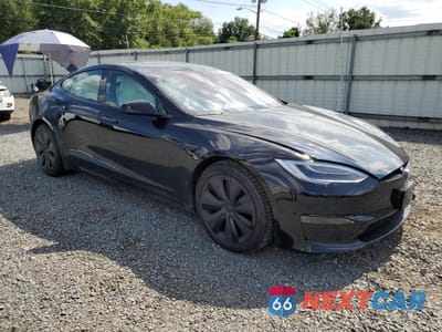 Czwarte zdjęcie samochodu z boku: 2022 TESLA MODEL S VIN:5YJSA1E56NF467755 - miniatura
