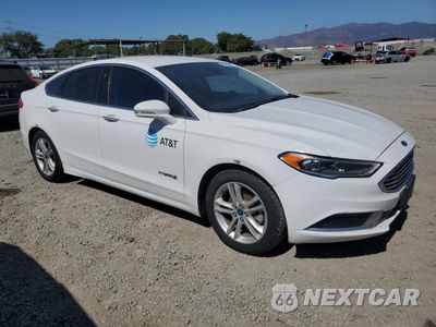 Czwarte zdjęcie samochodu z boku: 2018 FORD FUSION SE HYBRID VIN:3FA6P0LU6JR129839 - miniatura