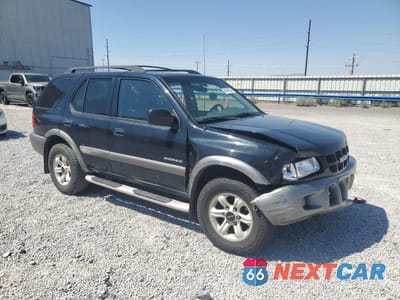Czwarte zdjęcie samochodu z boku: 2002 ISUZU RODEO S VIN:4S2DM58W324340853 - miniatura