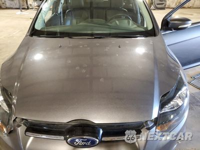 Zdjęcie 11 z 12 samochodu: 2013 FORD FOCUS TITANIUM VIN:1FADP3N24DL156545 - miniatura