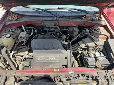 Zdjęcie 12 z 13 samochodu: 2001 FORD ESCAPE XLS VIN:1FMYU01101KB29324 - miniatura