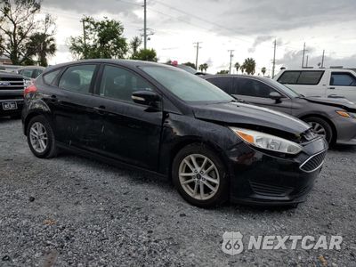 Czwarte zdjęcie samochodu z boku: 2017 FORD FOCUS SE VIN:1FADP3K20HL345574 - miniatura