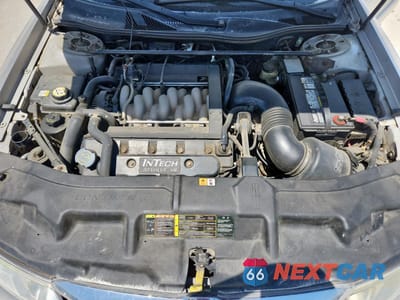Zdjęcie 11 z 14 samochodu: 2002 LINCOLN CONTINENTAL VIN:1LNHM97V72Y693131 - miniatura