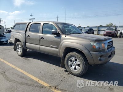 Czwarte zdjęcie samochodu z boku: 2010 TOYOTA TACOMA DOUBLE CAB VIN:5TELU4EN9AZ704390 - miniatura