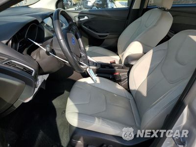Zdjęcie 7 z 14 samochodu: 2016 FORD FOCUS TITANIUM VIN:1FADP3N21GL256428 - miniatura