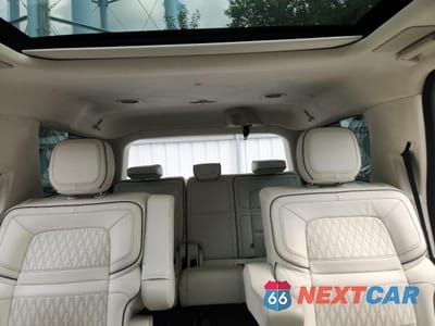 Zdjęcie 10 z 15 samochodu: 2023 LINCOLN NAVIGATOR BLACK LABEL VIN:5LMJJ2TG1PEL15532 - miniatura