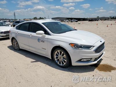 Czwarte zdjęcie samochodu z boku: 2017 FORD FUSION SE HYBRID VIN:3FA6P0LUXHR409032 - miniatura