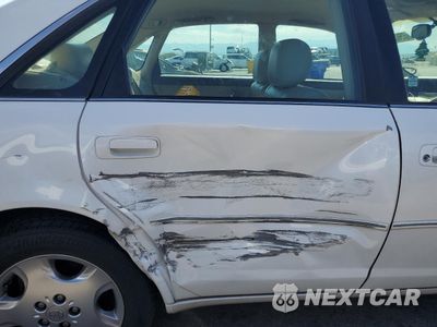 Zdjęcie 10 z 12 samochodu: 2004 TOYOTA AVALON XL VIN:4T1BF28B94U372701 - miniatura