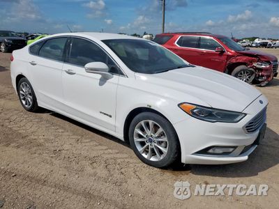 Czwarte zdjęcie samochodu z boku: 2017 FORD FUSION SE HYBRID VIN:3FA6P0LU0HR409606 - miniatura