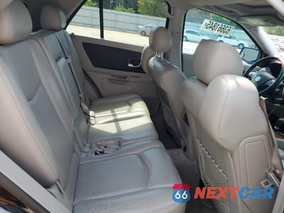 Zdjęcie 10 z 14 samochodu: 2006 CADILLAC SRX VIN:1GYEE637460120566 - miniatura