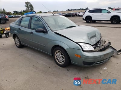 Czwarte zdjęcie samochodu z boku: 2005 FORD FOCUS ZX4 VIN:1FAFP34N55W123056 - miniatura