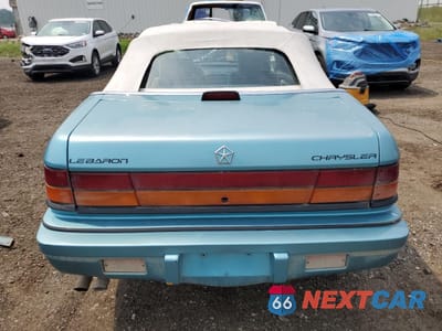 Zdjęcie 6 z 15 samochodu: 1993 CHRYSLER LEBARON VIN:1C3XU4534PF560600 - miniatura
