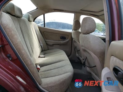 Zdjęcie 10 z 12 samochodu: 2002 HYUNDAI ELANTRA GLS VIN:KMHDN45D42U260866 - miniatura