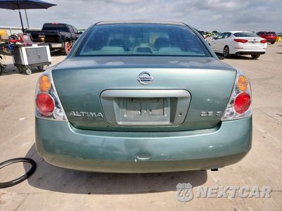 Zdjęcie 6 z 14 samochodu: 2003 NISSAN ALTIMA BASE VIN:1N4AL11D13C183968 - miniatura