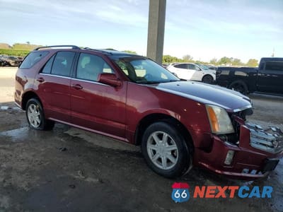 Czwarte zdjęcie samochodu z boku: 2004 CADILLAC SRX VIN:1GYDE637740136463 - miniatura