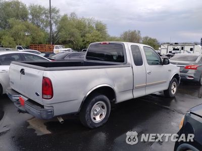 Czwarte zdjęcie samochodu z boku: 2001 FORD F150 VIN:1FTZX17251KF23293 - miniatura