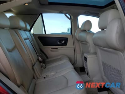 Zdjęcie 11 z 13 samochodu: 2004 CADILLAC SRX VIN:1GYDE637740136463 - miniatura