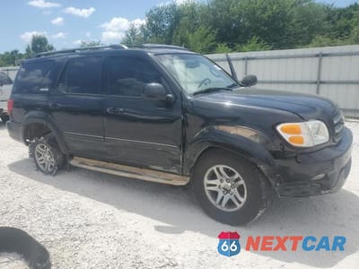 Czwarte zdjęcie samochodu z boku: 2003 TOYOTA SEQUOIA LIMITED VIN:5TDBT48A43S203303 - miniatura