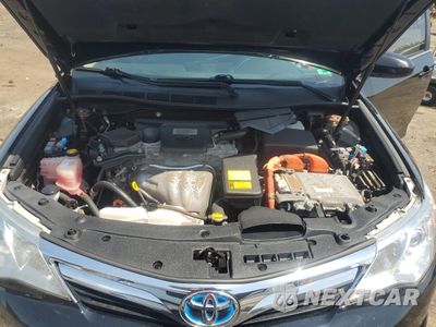 Zdjęcie 11 z 12 samochodu: 2012 TOYOTA CAMRY HYBRID VIN:4T1BD1FK2CU041282 - miniatura