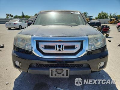 Piąte zdjęcie samochodu w środku: 2010 HONDA PILOT EX VIN:5FNYF3H48AB021563 - miniatura