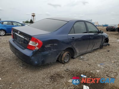Trzecie zdjęcie samochodu z tyłu: 2002 TOYOTA CAMRY LE VIN:4T1BE32K52U597101 - miniatura