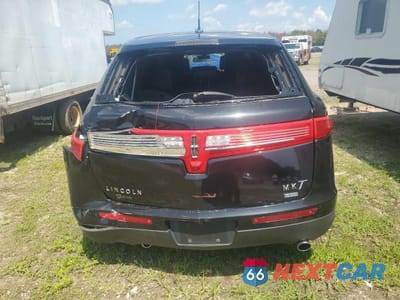 Zdjęcie 6 z 13 samochodu: 2013 LINCOLN MKT VIN:2L1MJ5LK8DBL58375 - miniatura