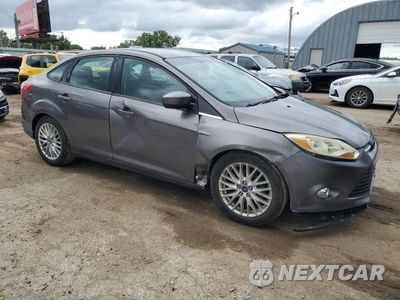 Czwarte zdjęcie samochodu z boku: 2012 FORD FOCUS SE VIN:1FAHP3F24CL196476 - miniatura