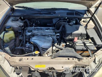Zdjęcie 11 z 12 samochodu: 2002 TOYOTA CAMRY LE VIN:JTDBE32K620099503 - miniatura