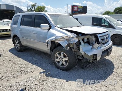 Czwarte zdjęcie samochodu z boku: 2011 HONDA PILOT TOURING VIN:5FNYF4H95BB056709 - miniatura