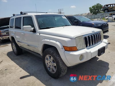 Czwarte zdjęcie samochodu z boku: 2010 JEEP COMMANDER LIMITED VIN:1J4RG5GT4AC109443 - miniatura